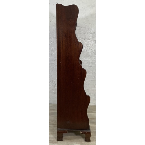 33 - A Georgian style mahogany five tier waterfall bookcase - approx. 152cm high x 80cm wide x 49cm deep