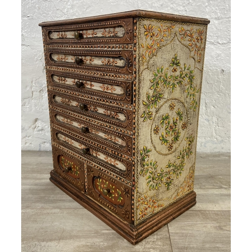 An Indian hand painted and decorated wooden spice cabinet chest of drawers approx. 48cm high x 38c