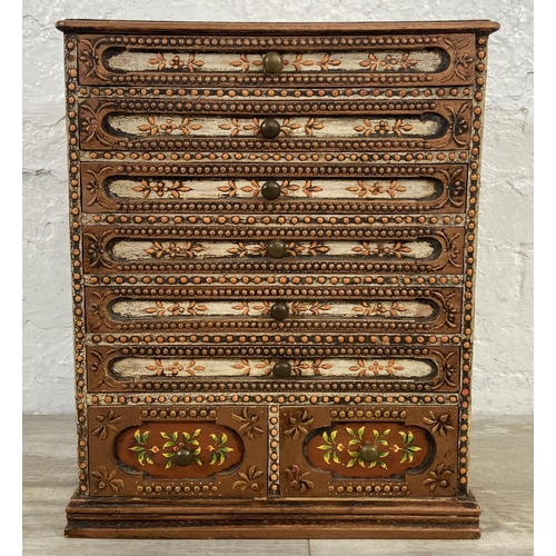 34 - An Indian hand-painted and decorated wooden spice cabinet/chest of drawers - approx. 48cm high x 38c... 