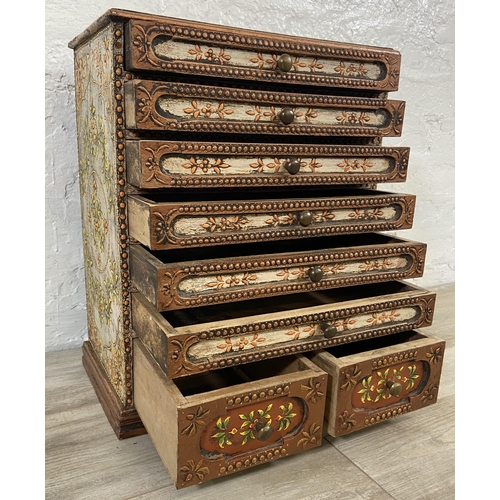 34 - An Indian hand-painted and decorated wooden spice cabinet/chest of drawers - approx. 48cm high x 38c... 