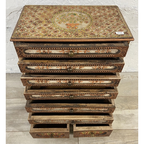 34 - An Indian hand-painted and decorated wooden spice cabinet/chest of drawers - approx. 48cm high x 38c... 