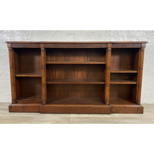 35 - A Georgian style mahogany breakfront three section open bookcase - approx. 84cm high x 158cm wide x ... 