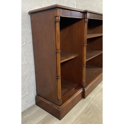 35 - A Georgian style mahogany breakfront three section open bookcase - approx. 84cm high x 158cm wide x ... 