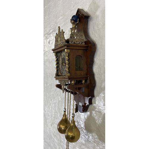 39 - A Dutch Zaanse brass and mahogany double weight wall clock - approx. 51cm high