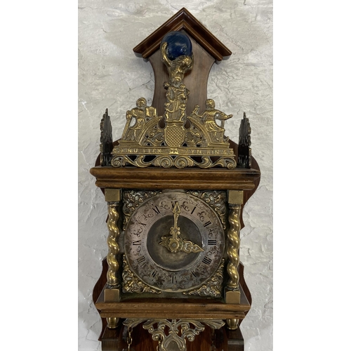 39 - A Dutch Zaanse brass and mahogany double weight wall clock - approx. 51cm high