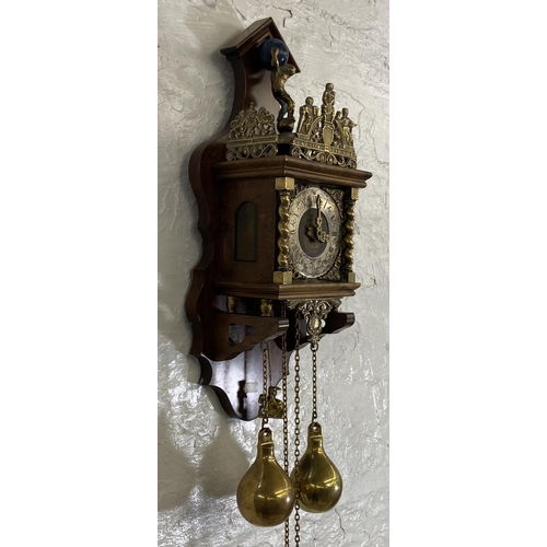 39 - A Dutch Zaanse brass and mahogany double weight wall clock - approx. 51cm high