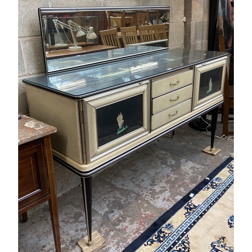 43 - A 1950s Italian Umberto Mascagni ebonised and faux leather chinoiserie dressing table on tapering su... 