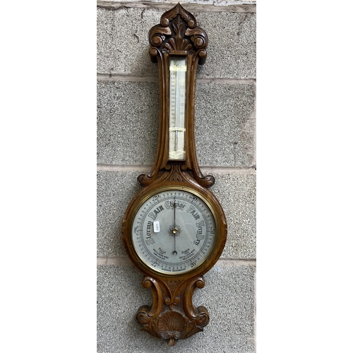 45 - Two 19th century wall mountable barometers, one carved oak cased - approx. 82cm high and one E. Good... 