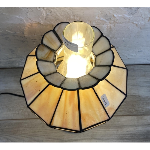 46 - A Tiffany style table lamp - approx. 42cm high