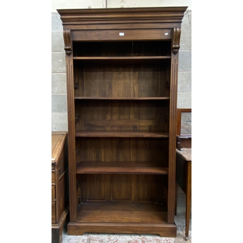 48 - A 19th century style carved hardwood five tier bookcase - approx. 210cm high x 112cm wide x 40cm dee... 