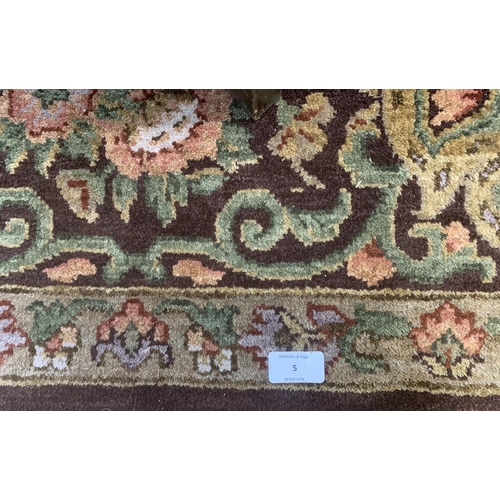 5 - An Eastern Kayam OCM Kaimuri brown ground floral pattern rug - approx. 300cm x 200cm