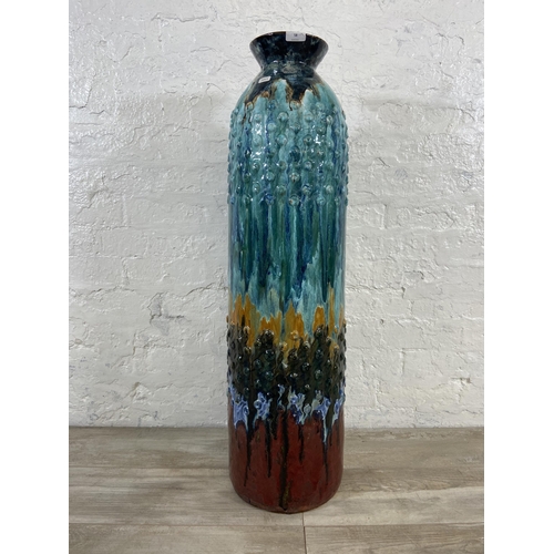 58 - A large drip glazed ceramic floor vase - approx. 97cm high