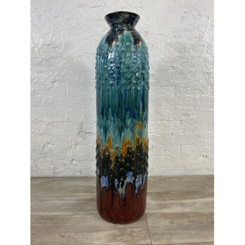 58 - A large drip glazed ceramic floor vase - approx. 97cm high