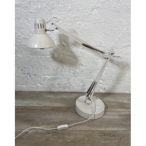 65 - A Lloytron L955 white metal swing arm hobby desk lamp on circular base