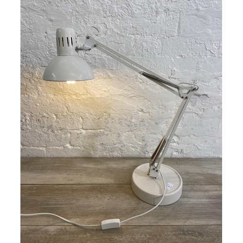 65 - A Lloytron L955 white metal swing arm hobby desk lamp on circular base