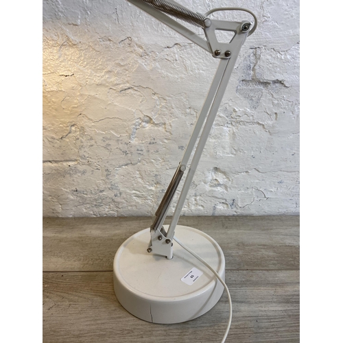 65 - A Lloytron L955 white metal swing arm hobby desk lamp on circular base