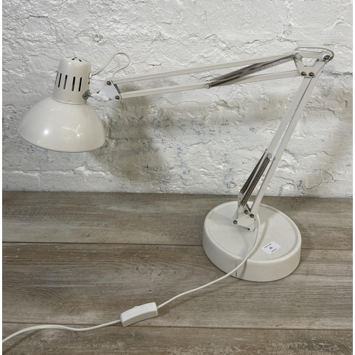 65 - A Lloytron L955 white metal swing arm hobby desk lamp on circular base