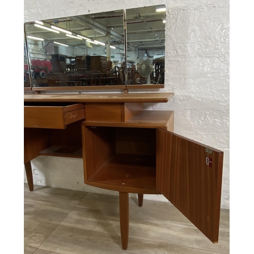 66 - A mid 20th century G Plan teak dressing table - approx. 120cm high including mirror x 127cm wide x 4... 