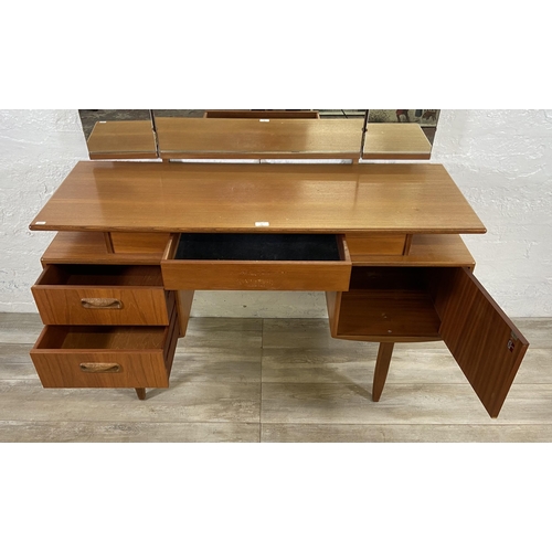 66 - A mid 20th century G Plan teak dressing table - approx. 120cm high including mirror x 127cm wide x 4... 