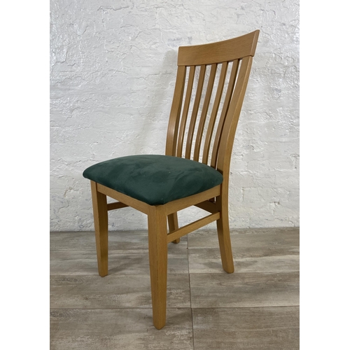 68 - Four modern oak and green fabric upholstered dining chairs