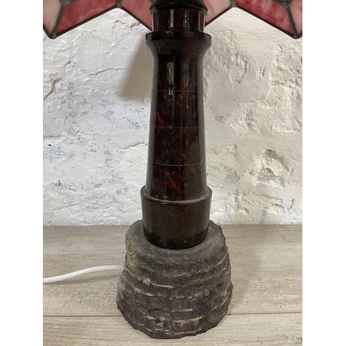 69 - A Tiffany style marble column table lamp on stone base with stained glass shade - approx. 47cm high