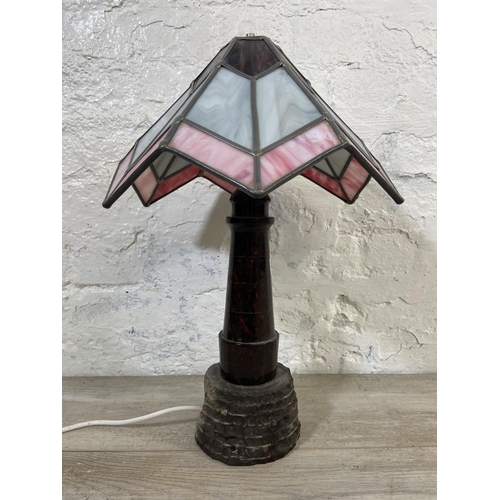 69 - A Tiffany style marble column table lamp on stone base with stained glass shade - approx. 47cm high