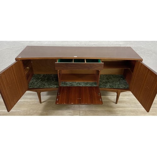 71 - A mid 20th century Elliotts of Newbury zebrano and teak concaved sideboard - approx. 76cm high x 150... 