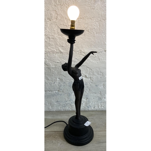 72 - An Art Deco style Widdop Bingham & Co Ltd bronzed resin figural table lamp on circular base - approx... 