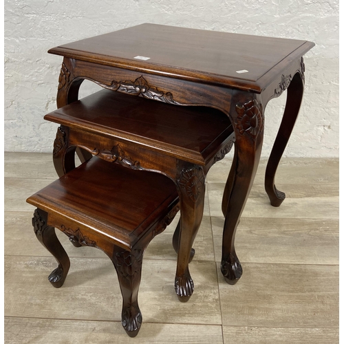 73 - A Georgian style carved mahogany nest of three tables - approx. 59cm high x 60cm wide x 45cm deep