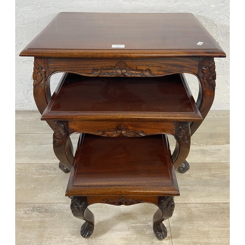 73 - A Georgian style carved mahogany nest of three tables - approx. 59cm high x 60cm wide x 45cm deep