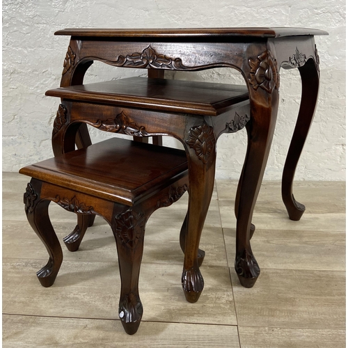 73 - A Georgian style carved mahogany nest of three tables - approx. 59cm high x 60cm wide x 45cm deep