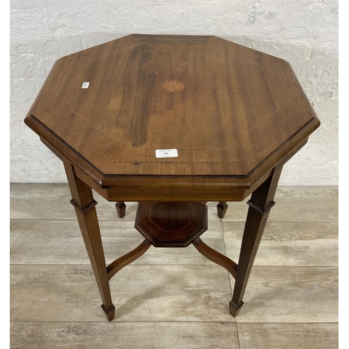 74 - An Edwardian inlaid mahogany octagonal two tier side table - approx. 71cm high x 60cm wide x 60cm de... 