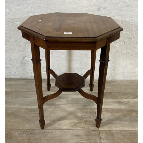 74 - An Edwardian inlaid mahogany octagonal two tier side table - approx. 71cm high x 60cm wide x 60cm de... 