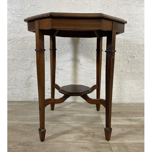 74 - An Edwardian inlaid mahogany octagonal two tier side table - approx. 71cm high x 60cm wide x 60cm de... 