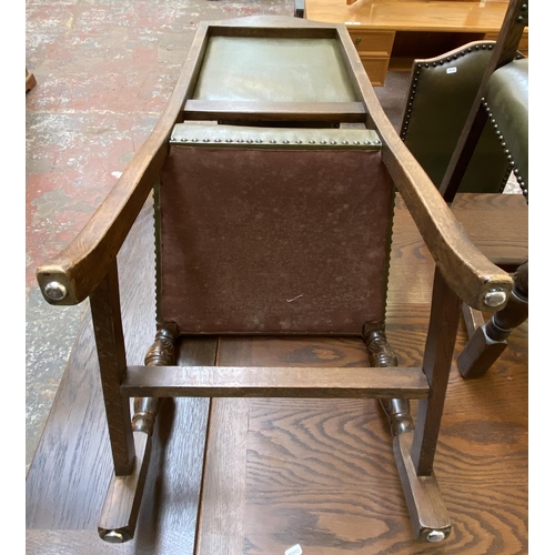 75 - A 17th century style oak rectangular refectory dining table and six green vinyl upholstered dining c... 