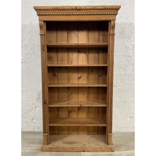 76 - A 19th century style pine six tier bookcase - approx. 105cm high x 58cm wide x 20cm deep