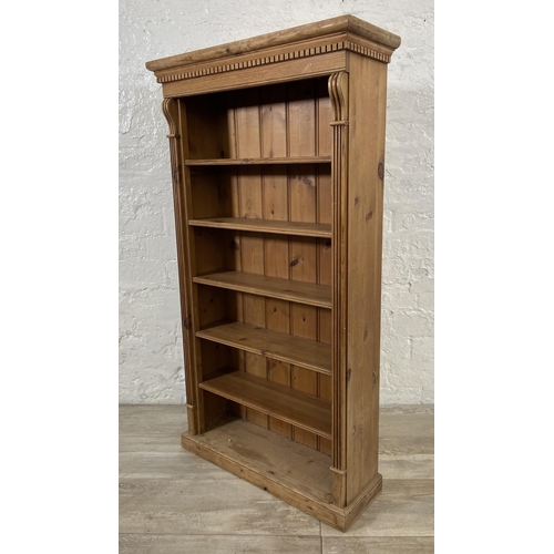 76 - A 19th century style pine six tier bookcase - approx. 105cm high x 58cm wide x 20cm deep