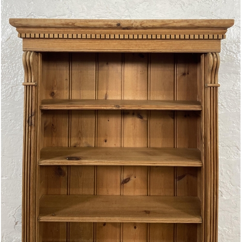 76 - A 19th century style pine six tier bookcase - approx. 105cm high x 58cm wide x 20cm deep