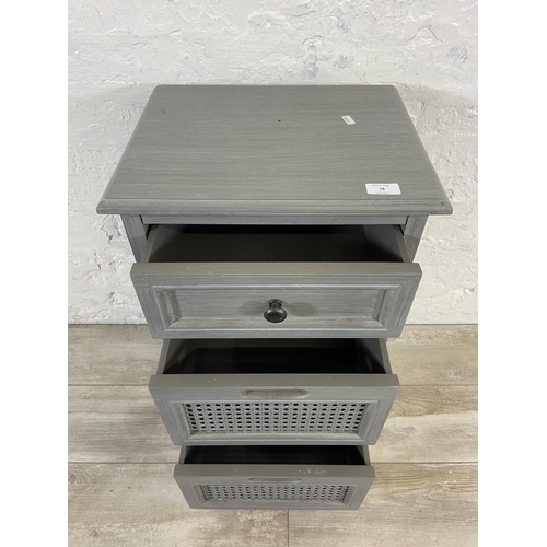 78 - A Dunelm Lucy Cane grey painted bedside chest of drawers -approx. 72cm high x 40cm wide x 32cm deep