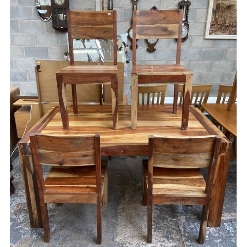 86 - An Indian sheesham wood rectangular dining table and four chairs - approx. 76cm high x 89cm wide x 1... 