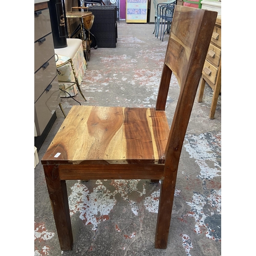 86 - An Indian sheesham wood rectangular dining table and four chairs - approx. 76cm high x 89cm wide x 1... 