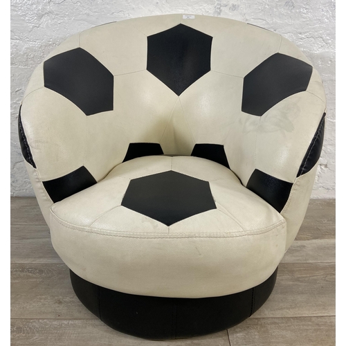 87 - A Relaxation black and white leatherette swivel football chair - approx. 71cm high