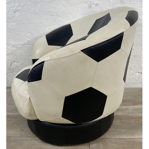 87 - A Relaxation black and white leatherette swivel football chair - approx. 71cm high