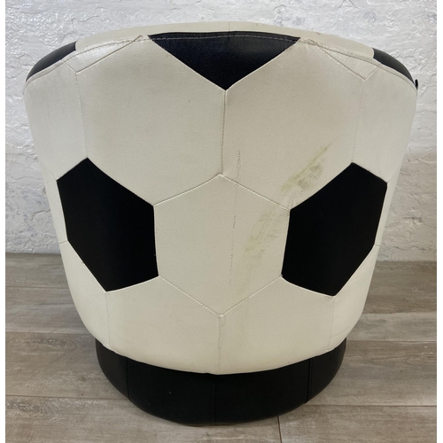 87 - A Relaxation black and white leatherette swivel football chair - approx. 71cm high