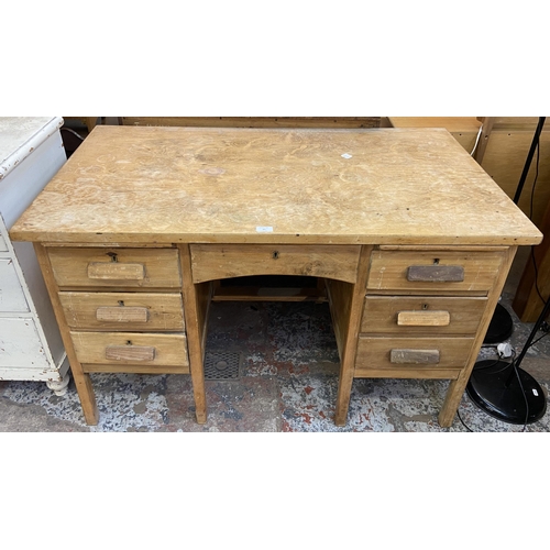 88 - A mid 20th century beech pedestal office desk - approx. 78cm high x 120cm wide x 69cm deep