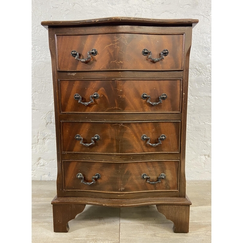 89 - A mahogany serpentine miniature chest of drawers on bracket supports - approx. 71cm high x 48cm wide... 