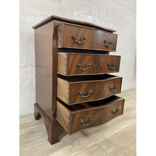 89 - A mahogany serpentine miniature chest of drawers on bracket supports - approx. 71cm high x 48cm wide... 