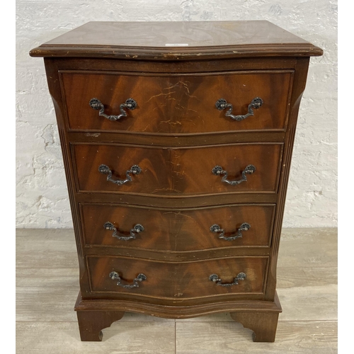 89 - A mahogany serpentine miniature chest of drawers on bracket supports - approx. 71cm high x 48cm wide... 