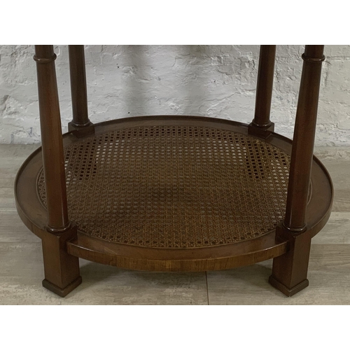 9 - An Art Deco style burr walnut and rattan oval two tier side table - approx. 56cm high x 56cm wide x ... 