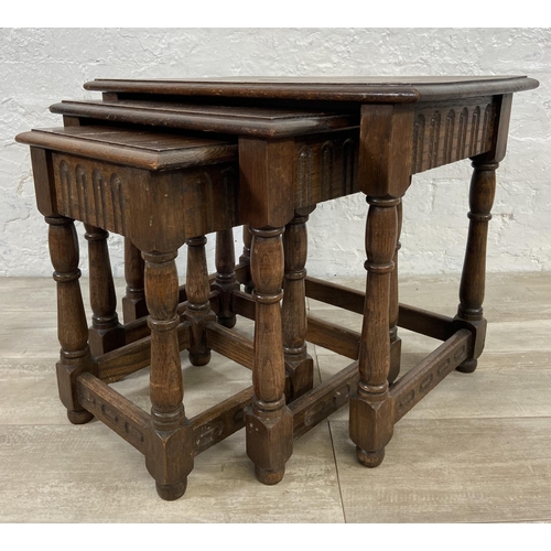 167 - Two pieces of oak furniture, one nest of tables and one barley twist stool